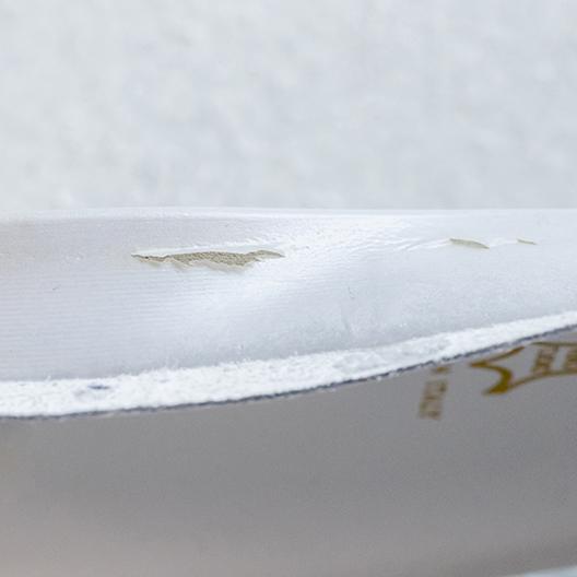 Skin delamination of a polyurethane insole in shoe sole manufacturing
